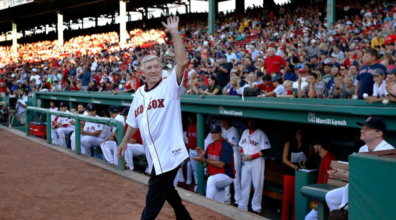 FILE - Former Boston Red Sox manager Joe Morgan waves to fans as he is honored prior to a baseball game between the Red Sox and the Seattle Mariners in Boston on July 30, 2013. (AP Photo/Elise Amendola, File)