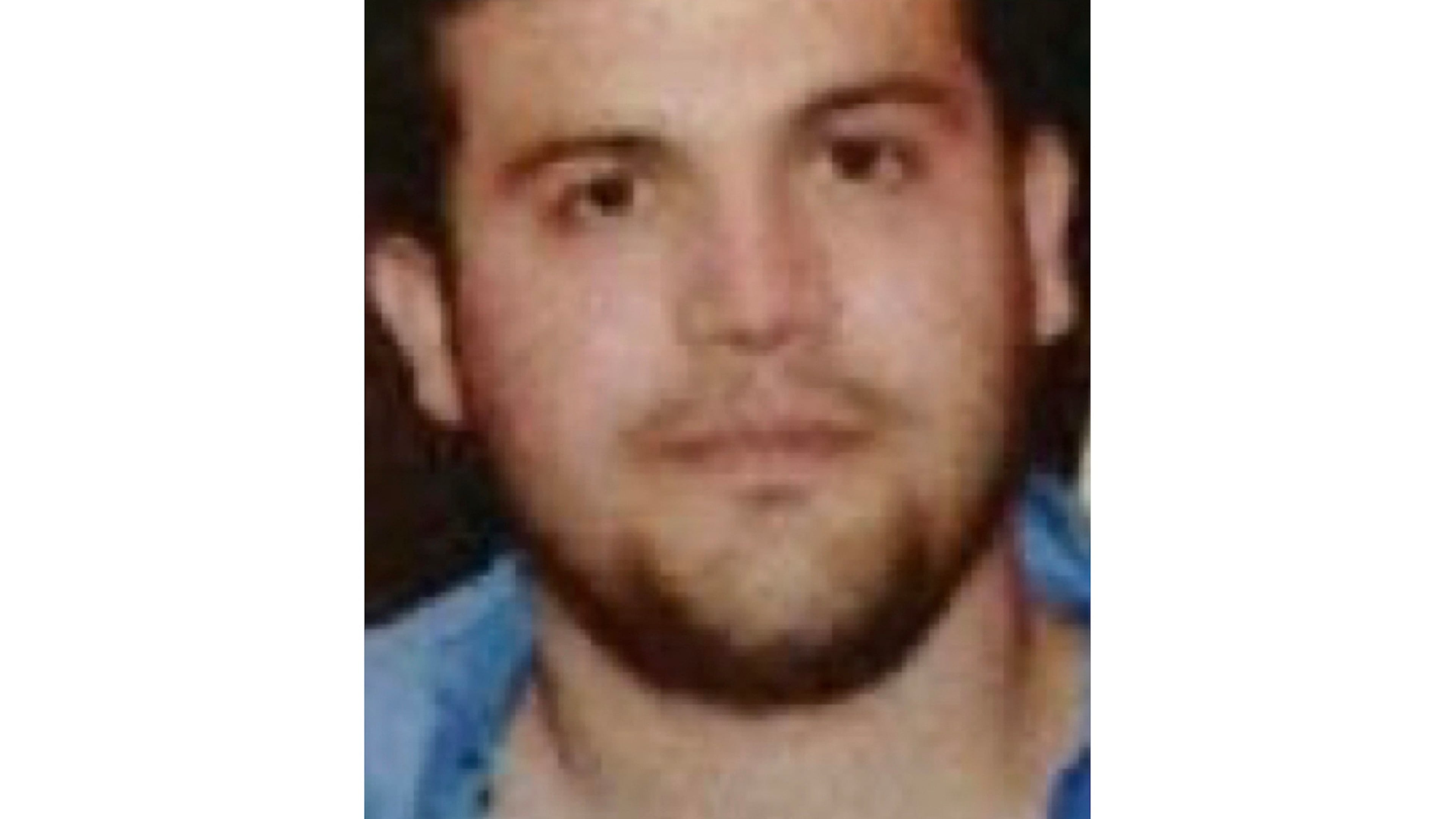 FILE - This image provided by the U.S. Department of State shows Joaquín Guzmán López after he was arrested by U.S. authorities in Texas. (U.S. Department of State via AP, File)