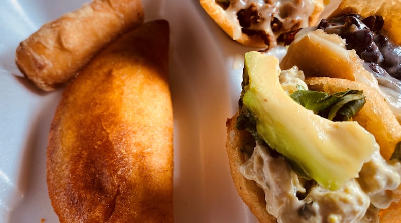 Cylantro’s Sampler includes mini arepas, a tequeno and an empanada. Bob Townsend for The Atlanta Journal-Constitution