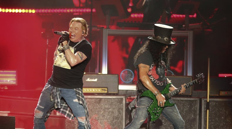 Guns N' Roses' Axl Rose, left, and Slash perform on the first weekend of the Austin City Limits Music Festival at Zilker Park on Friday, Oct. 4, 2019, in Austin, Texas. (Photo by Jack Plunkett/Invision/AP)