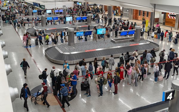 Security checkpoint lines were long enough to snake into baggage claim at Hartsfield-Jackson Atlanta International Airport on Monday.