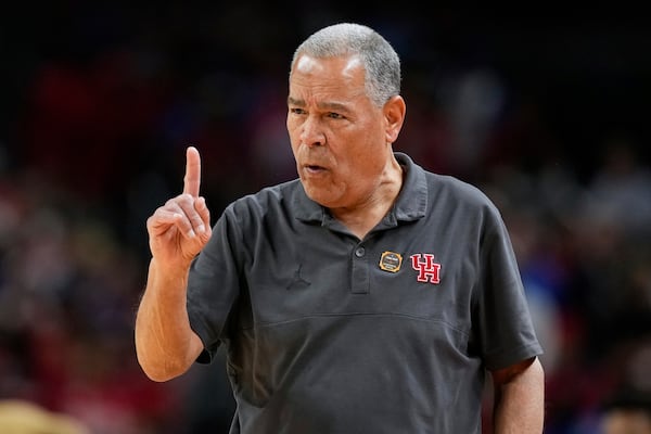Houston head coach Kelvin Sampson points during the first half against Florida in the national championship at the Final Four of the NCAA college basketball tournament, Monday, April 7, 2025, in San Antonio. (AP Photo/Brynn Anderson)