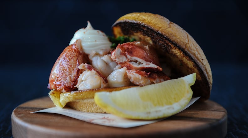 Lobster Roll - whole Maine lobster poached in butter, served warm on a toasted bun.
