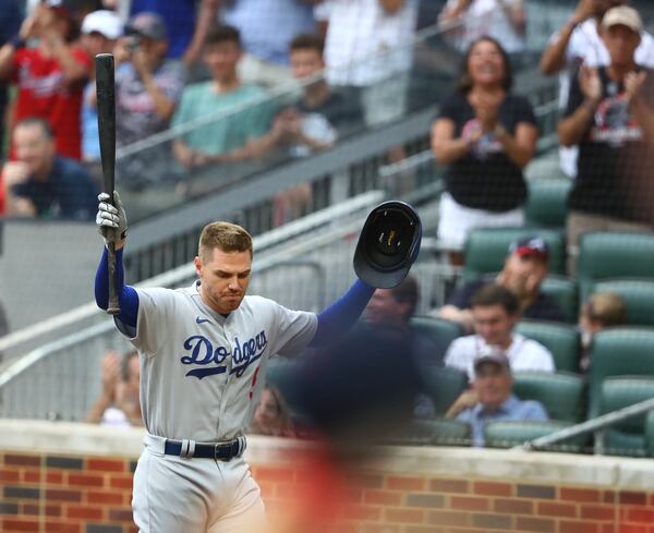 Former Braves first baseman Freddie Freeman steps away from the plate to thank cheering fans as he bats in the first inning at Truist Park on Sunday, June 26, 2022, in Atlanta.  “Curtis Compton / Curtis.Compton@ajc.com”