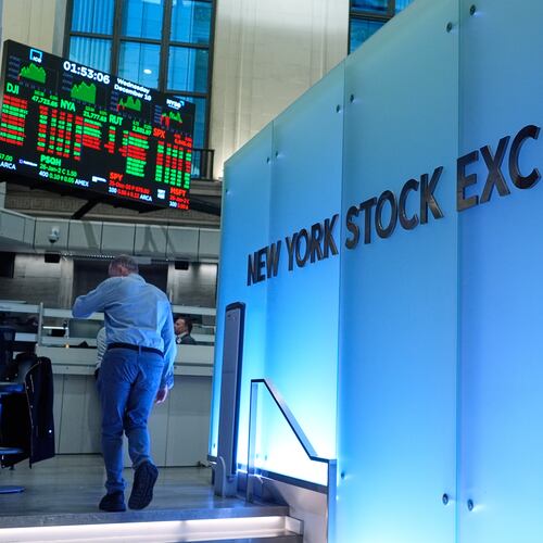 Traders work on the floor at the New York Stock Exchange in New York, Wednesday, Dec. 10, 2025. (AP Photo/Seth Wenig)