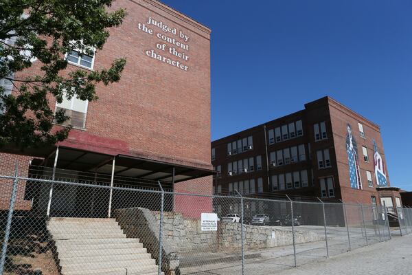 The Howard building is shown in 2015, before renovation work began. AJC file photo by BOB ANDRES  / BANDRES@AJC.COM
