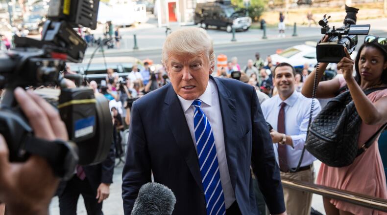 NEW YORK, NY - AUGUST 17: Republican Presidential hopeful Donald Trump arrives at Manhattan Supreme Court to report for jury duty on August 17, 2015 in New York City. Trump spent the last few days on the campaign trail at the Iowa state fair before returning to New York to perform the civic duty. (Photo by Andrew Burton/Getty Images)