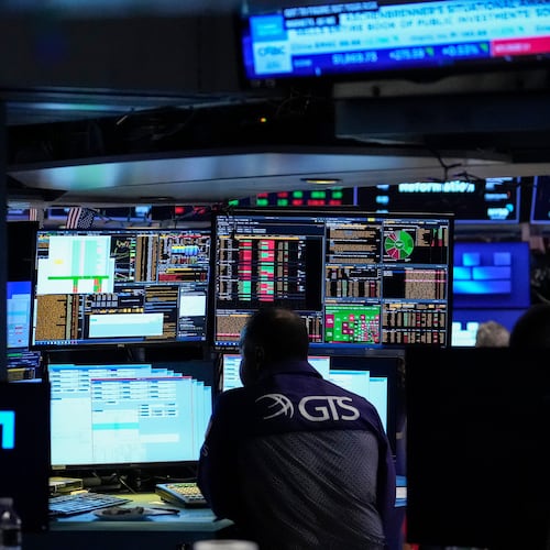 Specialist Dilip Patel works on the floor of the New York Stock Exchange, Thursday, July 30, 2026, in New York. (AP Photo/Yuki Iwamura)
