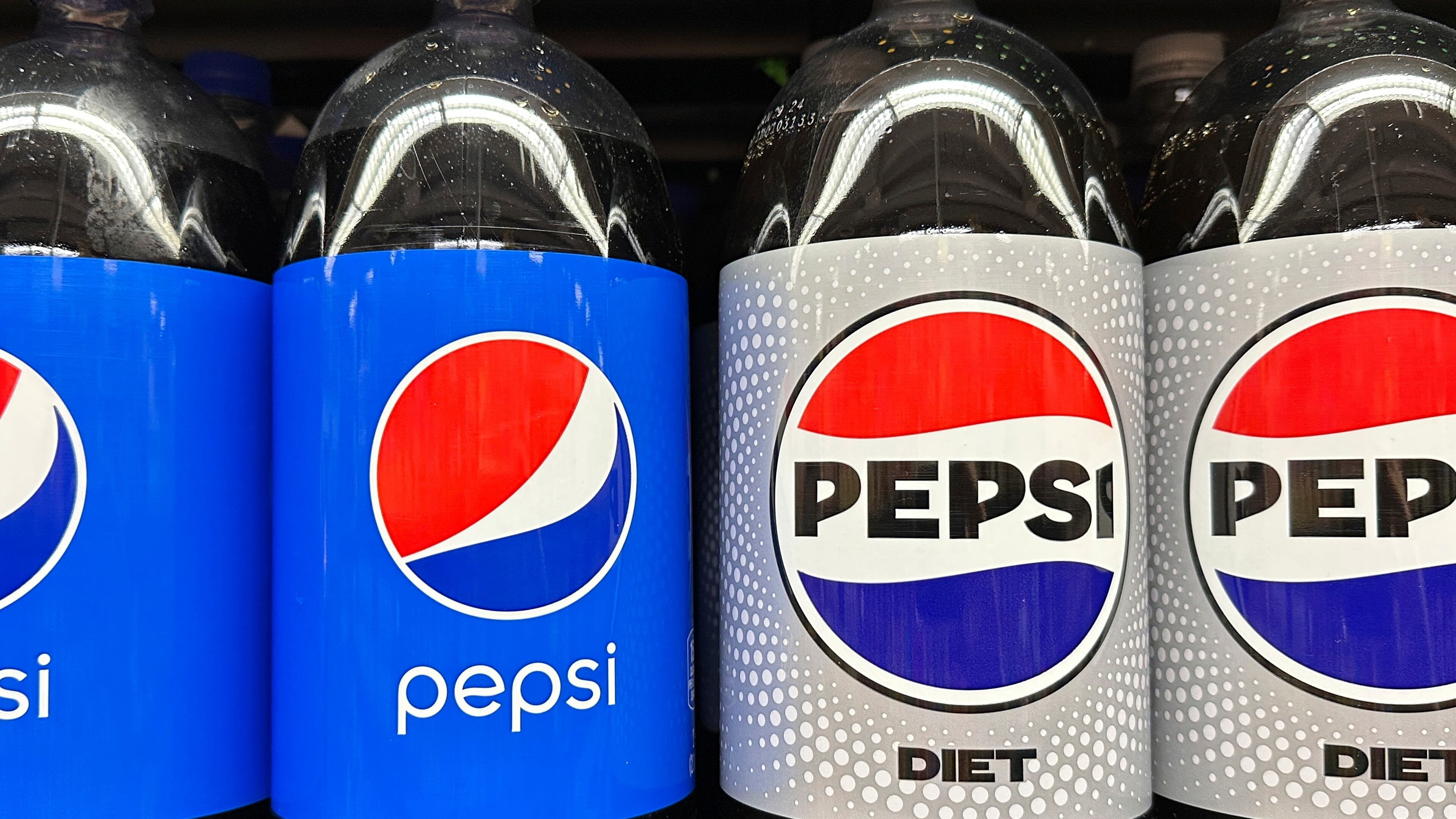 FILE - Plastic bottles of Pepsi are displayed at a grocery store, Nov. 15, 2023, in New York. (AP Photo/Ted Shaffrey, File)