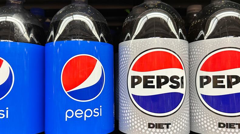 FILE - Plastic bottles of Pepsi are displayed at a grocery store, Nov. 15, 2023, in New York. (AP Photo/Ted Shaffrey, File)