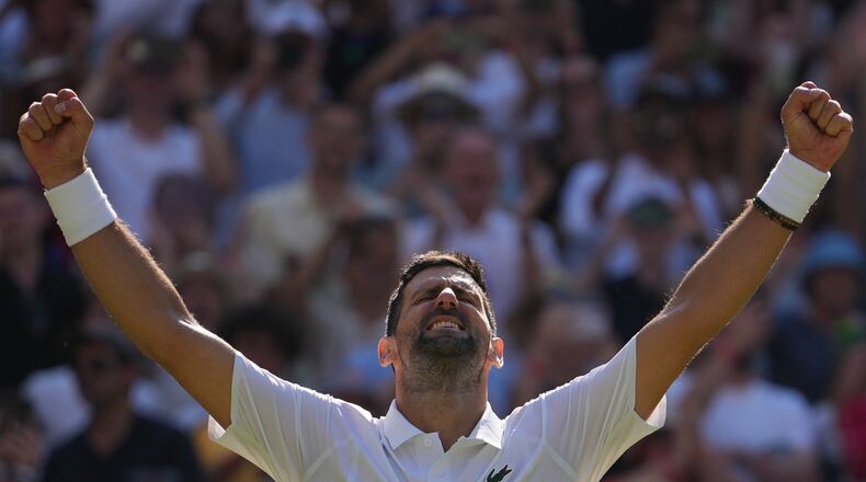 Novak Djokovic of Serbia celebrates his victory against Arthur Rinderknech of France in their third round men's singles match at the Wimbledon Tennis Championships in London, Friday, July 3, 2026. (AP Photo/Kin Cheung)
