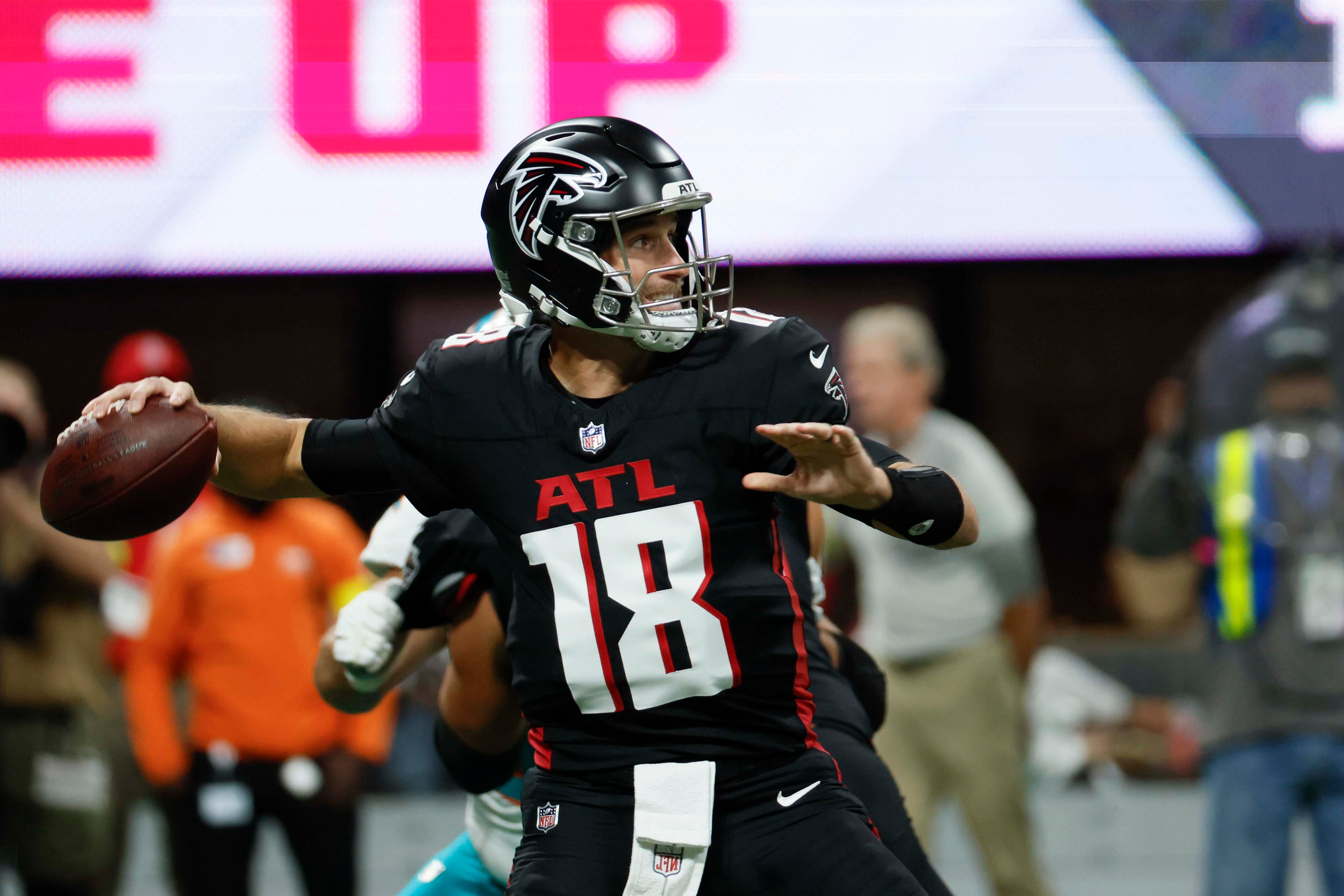 Atlanta Falcons quarterback Kirk Cousins attempts a pass during the first half of an NFL game against the Miami Dolphins at Mercedes-Benz Stadium in Atlanta on Sunday, Oct. 26, 2025. (Miguel Martinez/AJC)