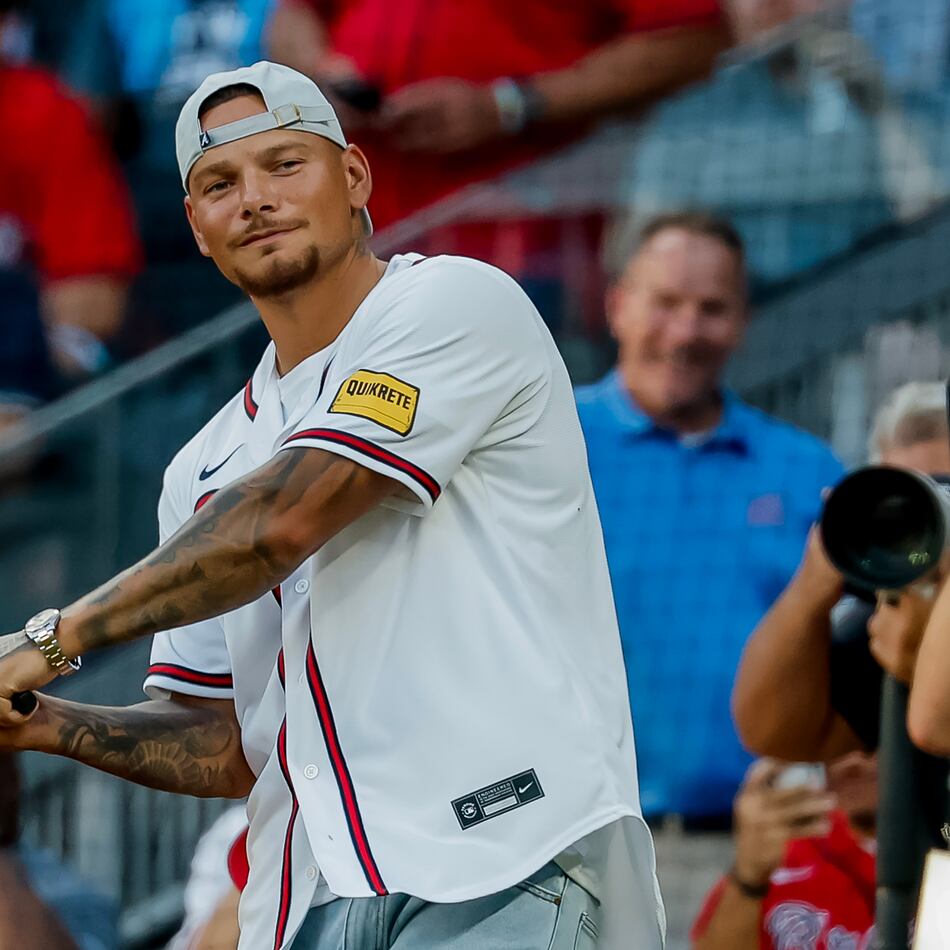 Country music singer Kane Brown gestures before reciting "Play Ball" before the Atlanta Braves hosted the Tampa Bay Rays on Wednesday, Sept. 9, 2026. (Erik S. Lesser/AP)