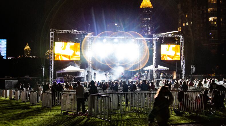 Big Night Out, a three-night concert event, kicked off Friday, October 23, 2020, at Centennial Olympic Park. Pods help ensure social distancing for music fans, seen here enjoying Pigeons Playing Ping Pong. Photo: Ryan Fleisher for The Atlanta Journal-Constitution