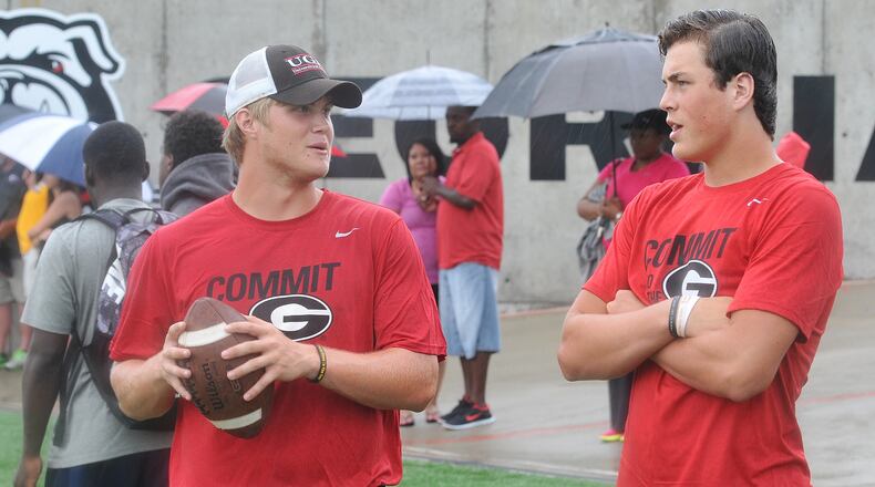 Jacob Eason, right, talks with another recruit, Logan Byrd, at Dawg Night in Athens in July 2014. (CHRIS HUNT/SPECIAL)