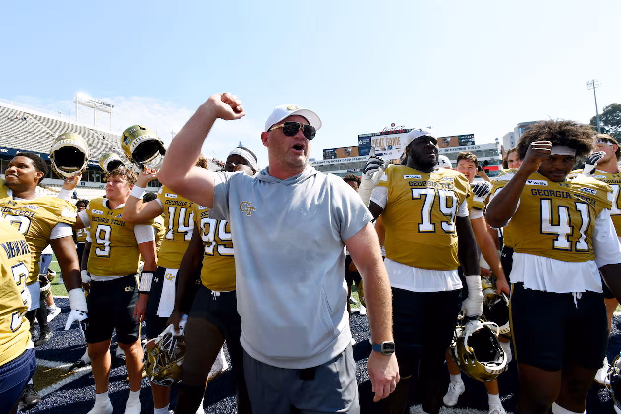 Georgia Tech head coach Brent Key and players celebrate after Georgia Tech defeated Mercer during the second half of an NCAA college football game at Bobby Dodd Stadium on Saturday, Sept. 19, 2026, in Atlanta. Georgia Tech defeated Mercer 44-11. (Hyosub Shin/AJC)