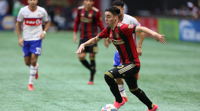 “It’s a beautiful city,” Miguel Almiron says. “I really like it here. I’m happy.”