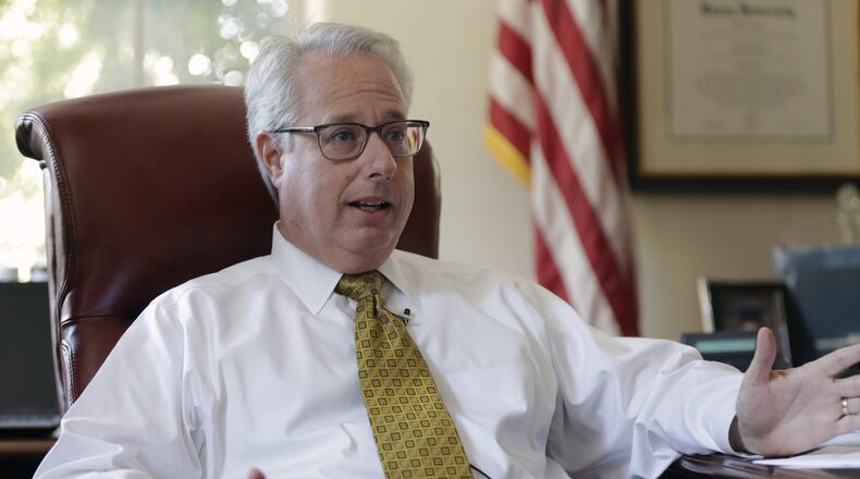Sam Olens photographed in the attorney general’s office, which he held from 2011 through October. BOB ANDRES /BANDRES@AJC.COM