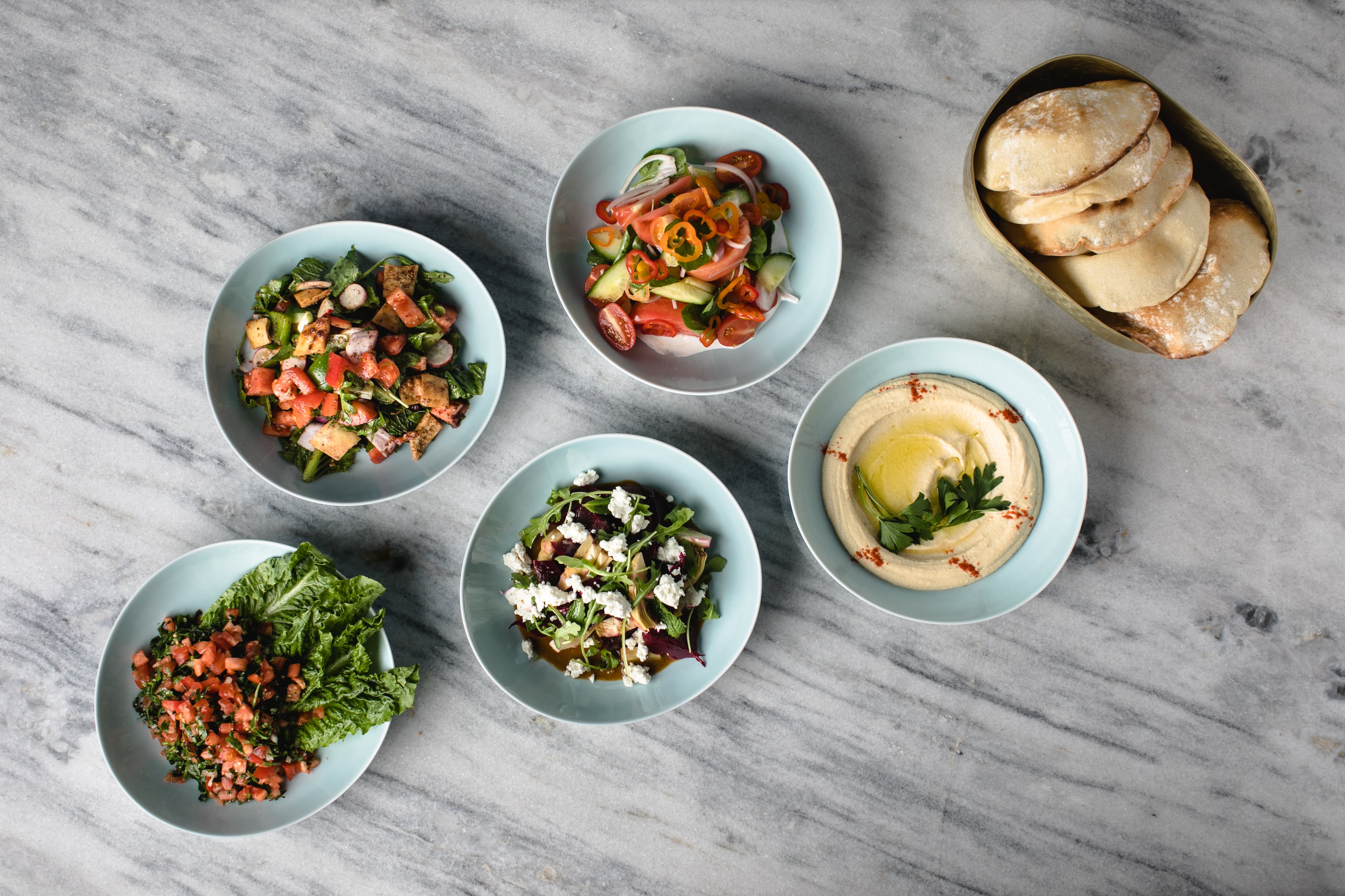 A selection of small dishes, known as mezze, is available at Zakia Modern Lebanese Restaurant in Buckhead. (Courtesy of Erik Meadows/Zakia)