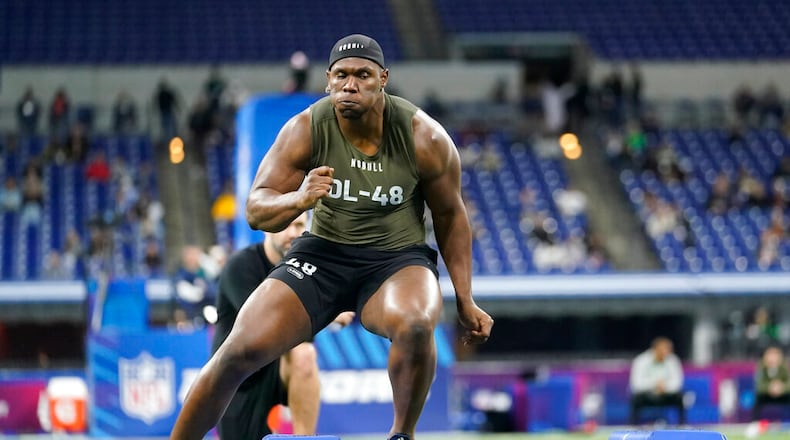 Georgia Tech defensive lineman Keion White runs a drill at the NFL football scouting combine in Indianapolis, Thursday, March 2, 2023. (AP Photo/Michael Conroy)
