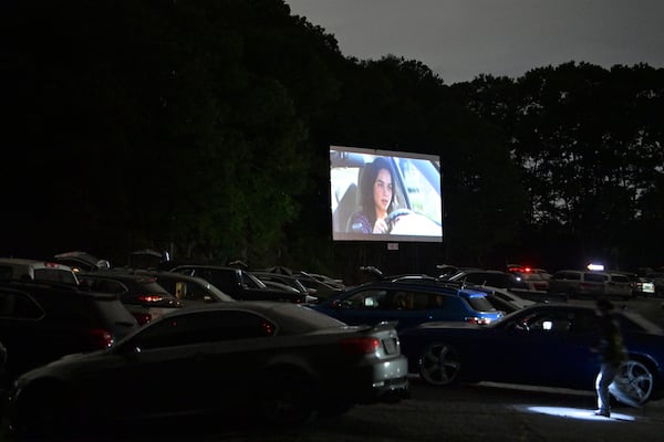 Movie-goers watch the movie from their vehicles at Starlight Drive-In Theatre, Friday, June 13, 2025, in Atlanta. (Hyosub Shin / AJC)