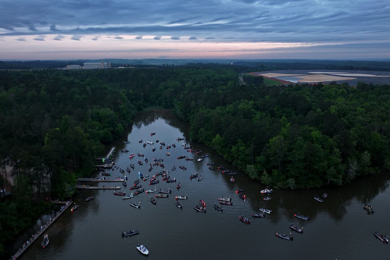 Contestants wait on the Lake Sinclair for the start of the GHSA State Bass Fishing Championship at Dennis Station Boat Ramp on Saturday, May 9, 2026, in Eatonton. The 2026 GHSA Bass Fishing State Championship at Lake Sinclair features a smaller field of 113 boats and presents a tougher challenge due to the lake’s size, shallow depth, and difficult early‑May fishing conditions. (Hyosub Shin/AJC)