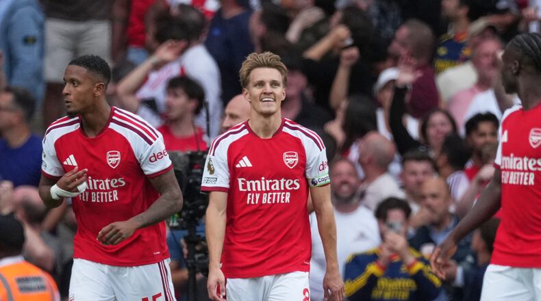 Arsenal's Martin Odegaard, centre, reacts during the English Premier League soccer match between Arsenal and Chelsea in London, Sunday, Sept. 6, 2026. (AP Photo/Dave Shopland)