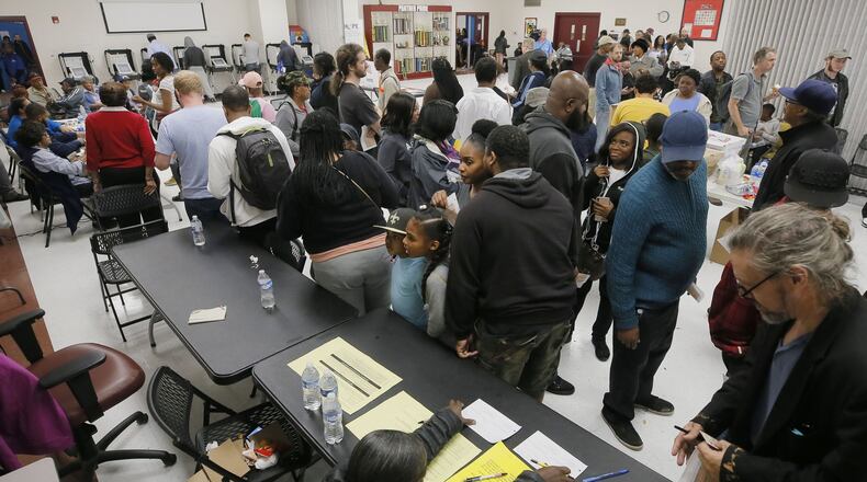 The wait time to vote at the Pittman Park precinct in Atlanta was reported to be three hours. The Fulton Board of Elections heard complaints from residents who worried about voter suppression. BOB ANDRES / BANDRES@AJC.COM AJC FILE PHOTO