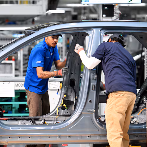 Workers check a Hyundai IONIQ 5 on the EV assembly line at Hyundai Motor Group Metaplant America in Ellabell near the Georgia coastal city of Savannah on Wednesday, May 6, 2026. (Hyosub Shin/AJC)