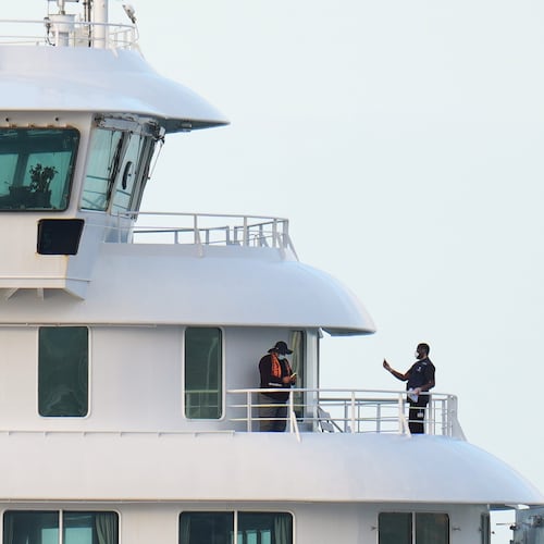 Passengers and crew at the hantavirus-stricken cruise ship MV Hondius after arriving at the port of Granadilla in Tenerife, Canary Islands, Spain, Sunday, May 10, 2026. (AP Photo/Manu Fernandez)
