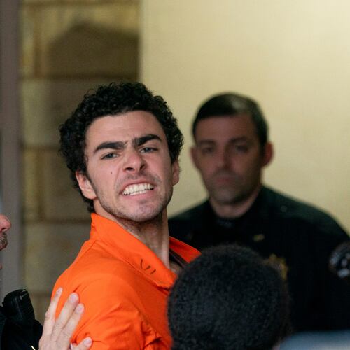 FILE - Suspect Luigi Mangione is taken into the Blair County Courthouse on Tuesday, Dec. 10, 2024, in Hollidaysburg, Pa. (Benjamin B. Braun/Pittsburgh Post-Gazette via AP, File)