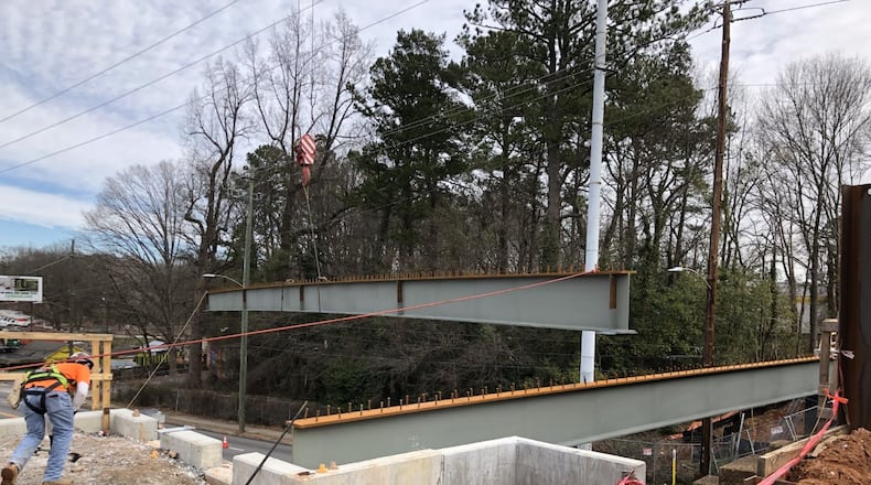 Beams being set in place for the new pedestrian trail over Metropolitan Parkway SW. CONTRIBUTED