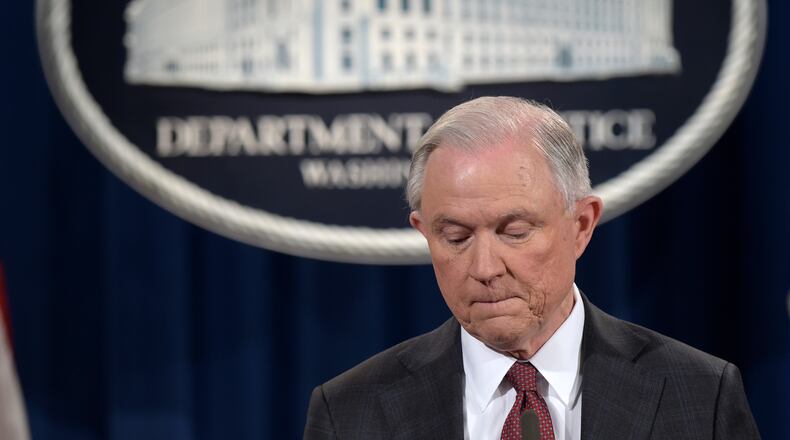 Attorney General Jeff Sessions pauses during a news conference at the Justice Department in Washington, Thursday, March 2, 2017. Sessions said he will recuse himself from a federal investigation into Russian interference in the 2016 White House election. (AP Photo/Susan Walsh)