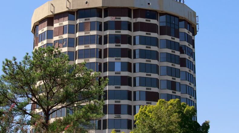 The building formerly known as the Presidential Boutique Condotel lies vacant and in disrepair.