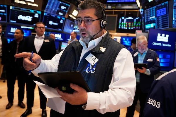 Trader Michael Capolino works on the floor of the New York Stock Exchange, Tuesday, April 29, 2025. (AP Photo/Richard Drew)