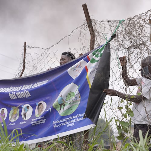 Workers at an Ebola treatment center go on strike over unpaid salaries and bonuses at Rwampara General Hospital, in Ituri, northeastern Congo, Monday, July 13, 2026, (AP Photo/Dirole Lotsima Dieudonne)