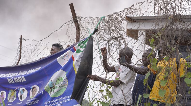 Workers at an Ebola treatment center go on strike over unpaid salaries and bonuses at Rwampara General Hospital, in Ituri, northeastern Congo, Monday, July 13, 2026, (AP Photo/Dirole Lotsima Dieudonne)