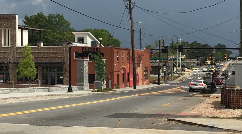 Duluth will spend $88,639 to reconstruct the pedestrian crossing on West Lawrenceville Street adjacent to The Block. Photo by Karen Huppertz for the AJC