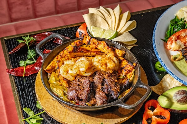 The street skillet, CT Cantina's version of fajitas, is served with rice, beans and fresh tortillas. (Courtesy of CT Cantina & Taqueria)