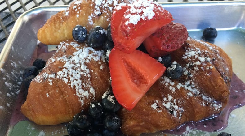 Once you’ve started eating the Little Farmhouse Cafe’s “glazed and berried” fried croissants with blueberries and strawberries, you might not want to stop. CONTRIBUTED BY WENDELL BROCK