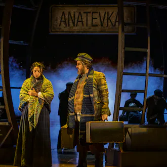 Mia Pinero as Hodel, left, and Itzik Cohen as Tevye in "Fiddler on the Roof" at the Alliance Theatre, a co-production with the Atlanta Opera, was selected as one of the nine best Atlanta theater productions of 2025 by critics of the AJC's partner publication ArtsATL. (Photo by Rafterman)