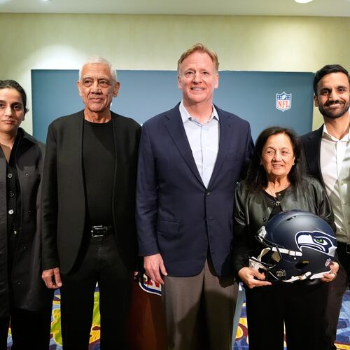 Seattle Seahawks owner's The Khosla family, and NFL commissioner Roger Goodell, Nina Khosla, left, Vinod Khosla, Neeru Khosla, and Neal Khosla pose for a portrait during a news conference at an NFL football owners meeting on Wednesday, Aug. 26, 2026, in Atlanta. (AP Photo/Brynn Anderson)