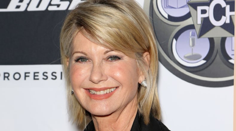 Entertainer Olivia Newton-John has postponed tour dates following a breast cancer diagnosis. (Photo by Gabe Ginsberg/FilmMagic)