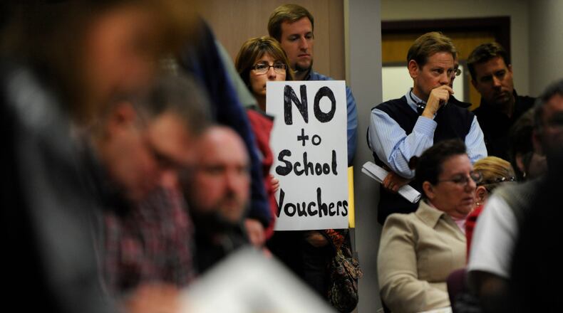 A defeated voucher bill rose from the ashes this past week, attached to another bill. It looks no better in its reincarnation.