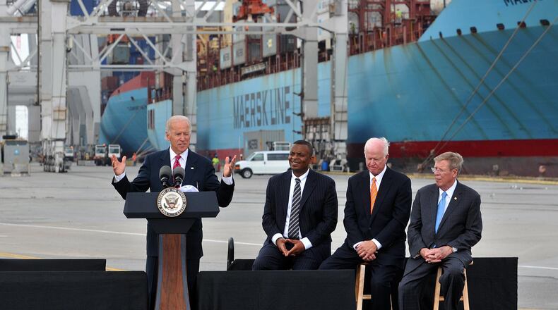 Joe Biden, left, speaks on the importance of infrastructure investment to a crowd of nearly 500 gathered at the docks of the Garden City Terminal of the Georgia Ports Authority in 2013. AP photo.