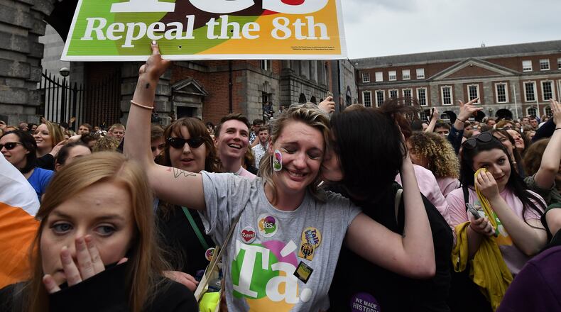 A Yes voter breaks down in tears as the result of the Irish referendum on the 8th amendment, concerning the country's abortion laws, is declared at Dublin Castle on May 26, 2018 in Dublin, Ireland. Ireland has voted in favour of overturning the abortion ban by 66.4% to 33.6%, which is a "resounding" victory for the yes campaign. (Photo by Charles McQuillan/Getty Images)