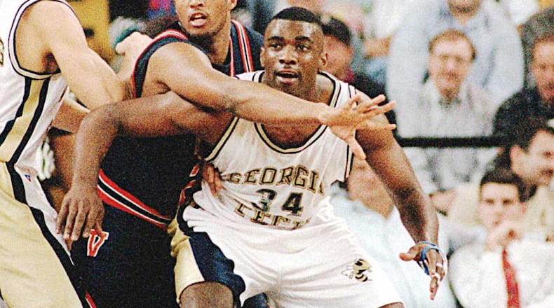 James Forrest battles for position in a 1994 game against Virginia. Two years earlier, his buzzer-beater against Southern California became an instant Tech tournament classic.