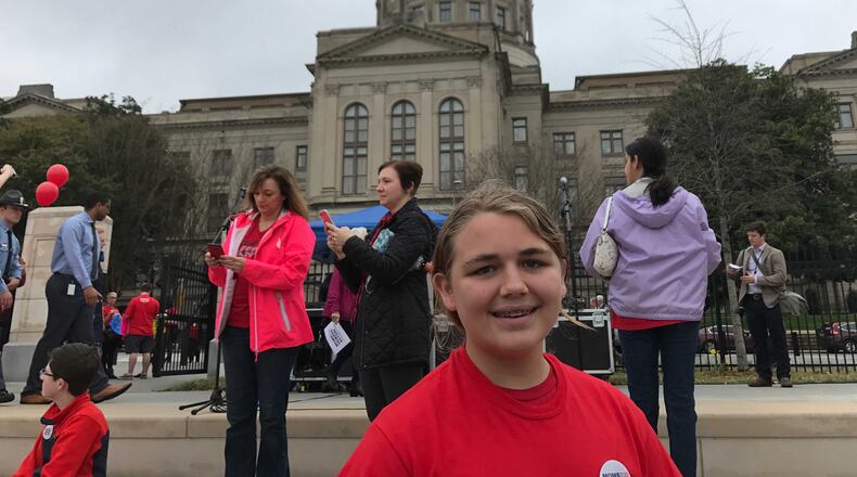 James Stevens, a 15-year-old student at Centennial High School in Roswell, joined his mother at a gun control demonstration Wednesday at the Georgia State Capitol. He and other students are becoming more active in the gun-control debate in the wake of the school shooting in Parkland, Fla. Vanessa McCray/AJC