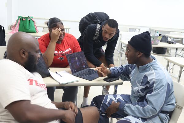 Students attending Clark Atlanta University’s Fundamentals of Music Business class taught byveteran music executives Jerry Clark and Bryan Calhoun break off into groups to develop a new artist campaign, marketing plan and budget on Monday, Sept. 22, 2025. The course teaches students about the inner workings of the music industry. (Natrice Miller/ AJC)