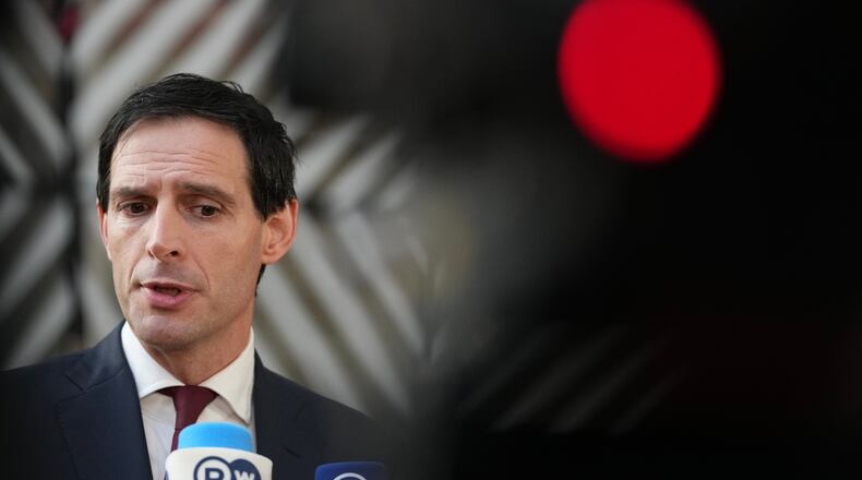 European Commissioner for Climate, Net-Zero and Clean Growth Wopke Hoekstra speaks with the media as he arrives for a meeting of EU Environment ministers at the European Council building in Brussels, Belgium, Tuesday, Nov. 4, 2025. (AP Photo/Virginia Mayo)